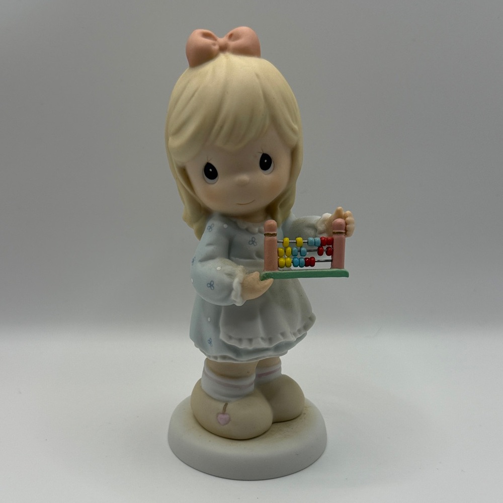 Precious Moments Cream and Blue Doll with Abacus